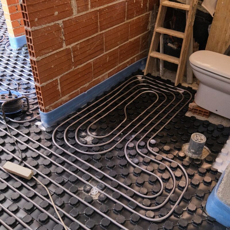 radiant-underfloor-heating-installation-in-a-bathroom-.jpg